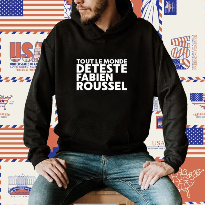 The "Tout Le Monde Deteste Fabien Roussel" shirt translates to "Everyone Hates Fabien Roussel" in English. This type of shirt is commonly used in political contexts to express a negative sentiment or disagreement towards a specific individual. Here's a general description: