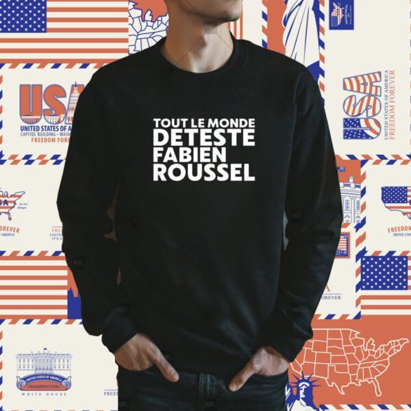 The "Tout Le Monde Deteste Fabien Roussel" shirt translates to "Everyone Hates Fabien Roussel" in English. This type of shirt is commonly used in political contexts to express a negative sentiment or disagreement towards a specific individual. Here's a general description: